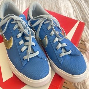 Nike sneakers authentic womens size 8 baby blue with gold stripe!
